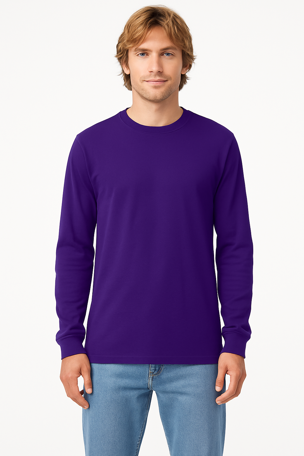 Man wearing a purple long-sleeve shirt and blue jeans on a white background