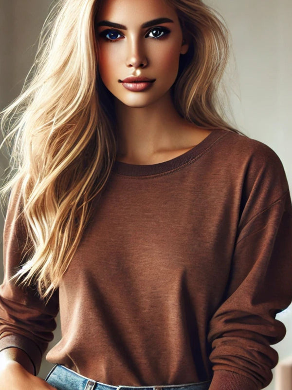 blond women wearing a brown long sleeve t-shirt