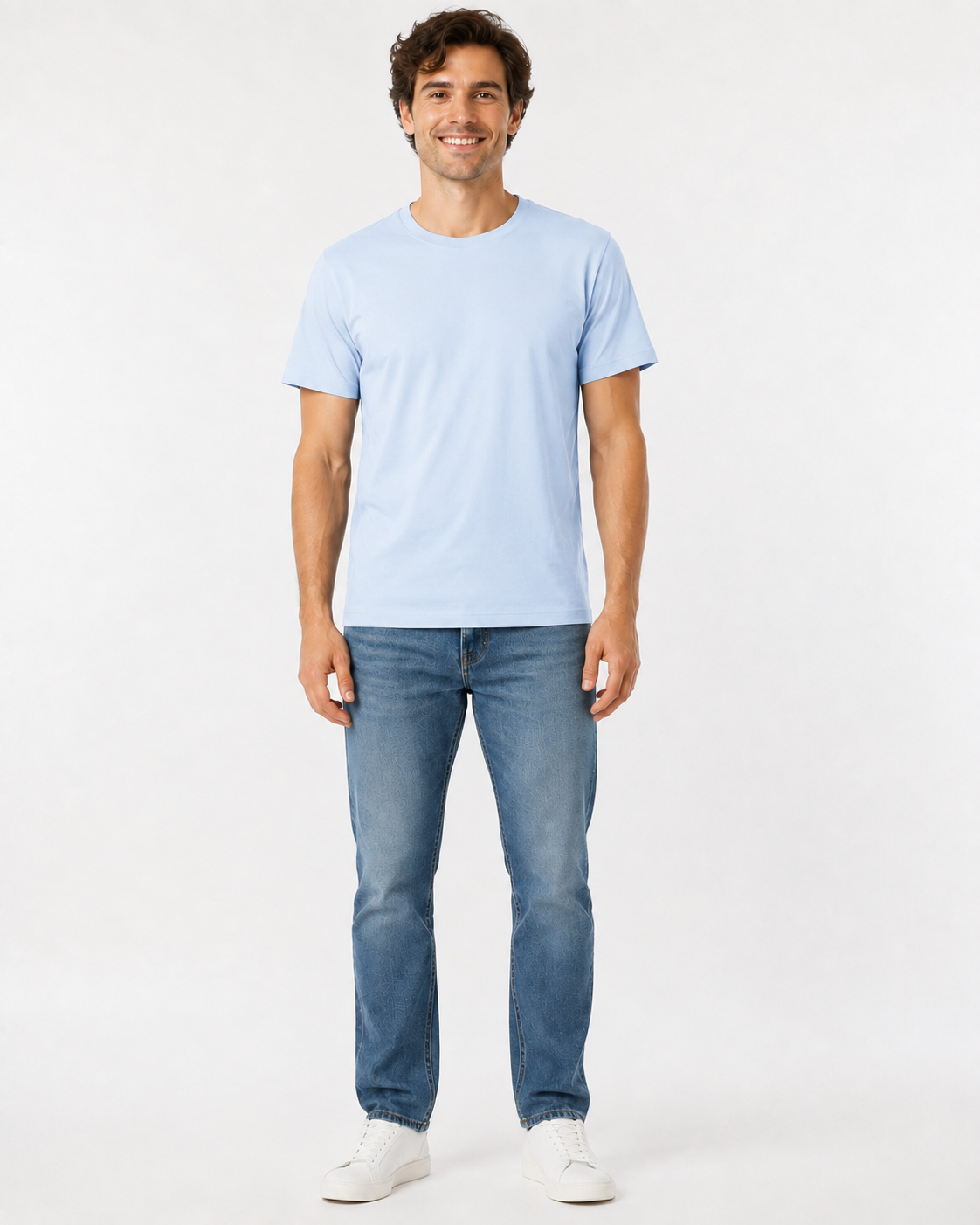 men's icy blue t-shirt, jeans and white sneakers lifestyle image on a white background
